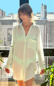Slouchy button up, oversized in Aqua color. Sizes available small to extra large. Made from rayon.